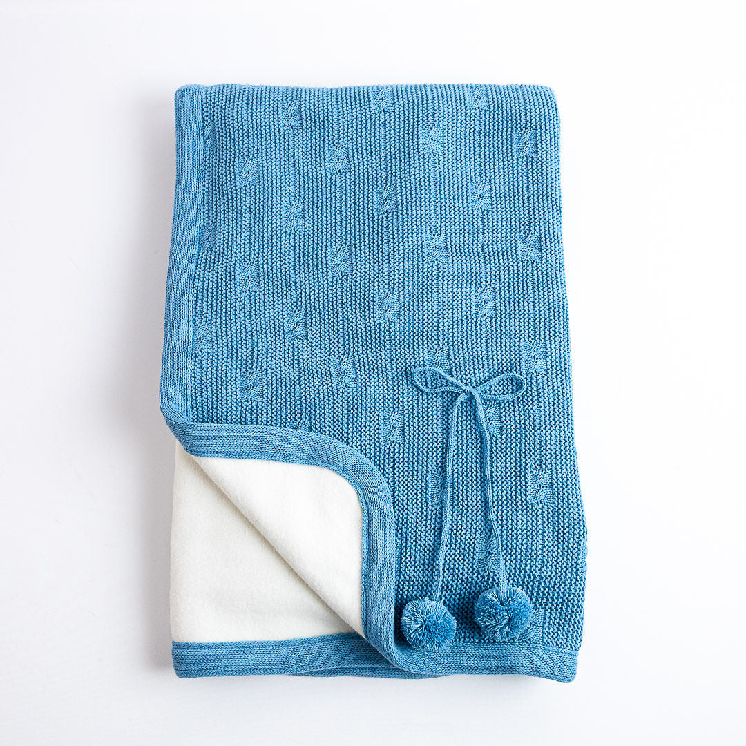 Manta Pompones Clásica