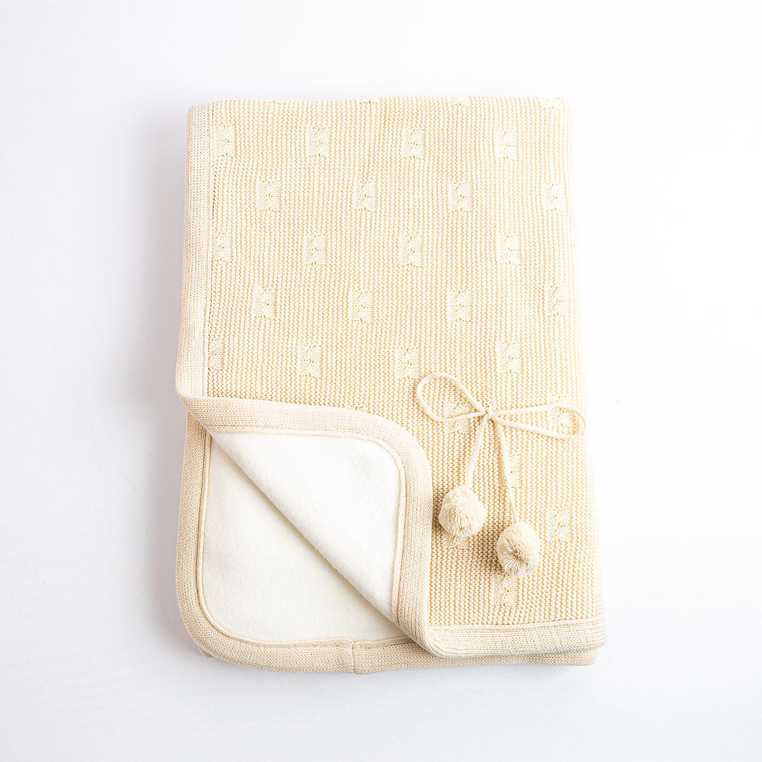 Manta Pompones Clásica