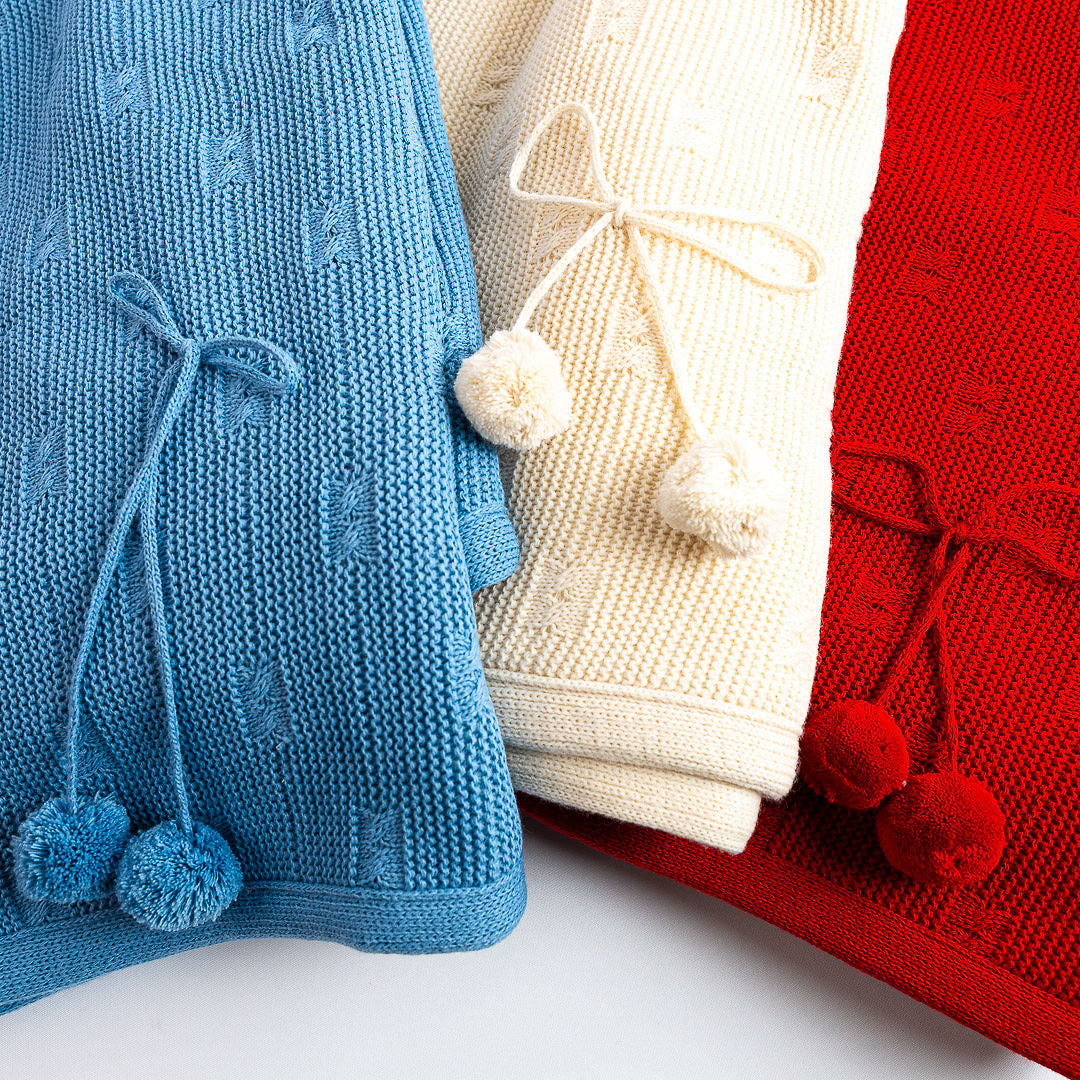 Manta Pompones Clásica