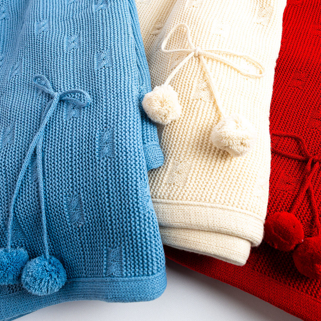 Manta Pompones Clásica