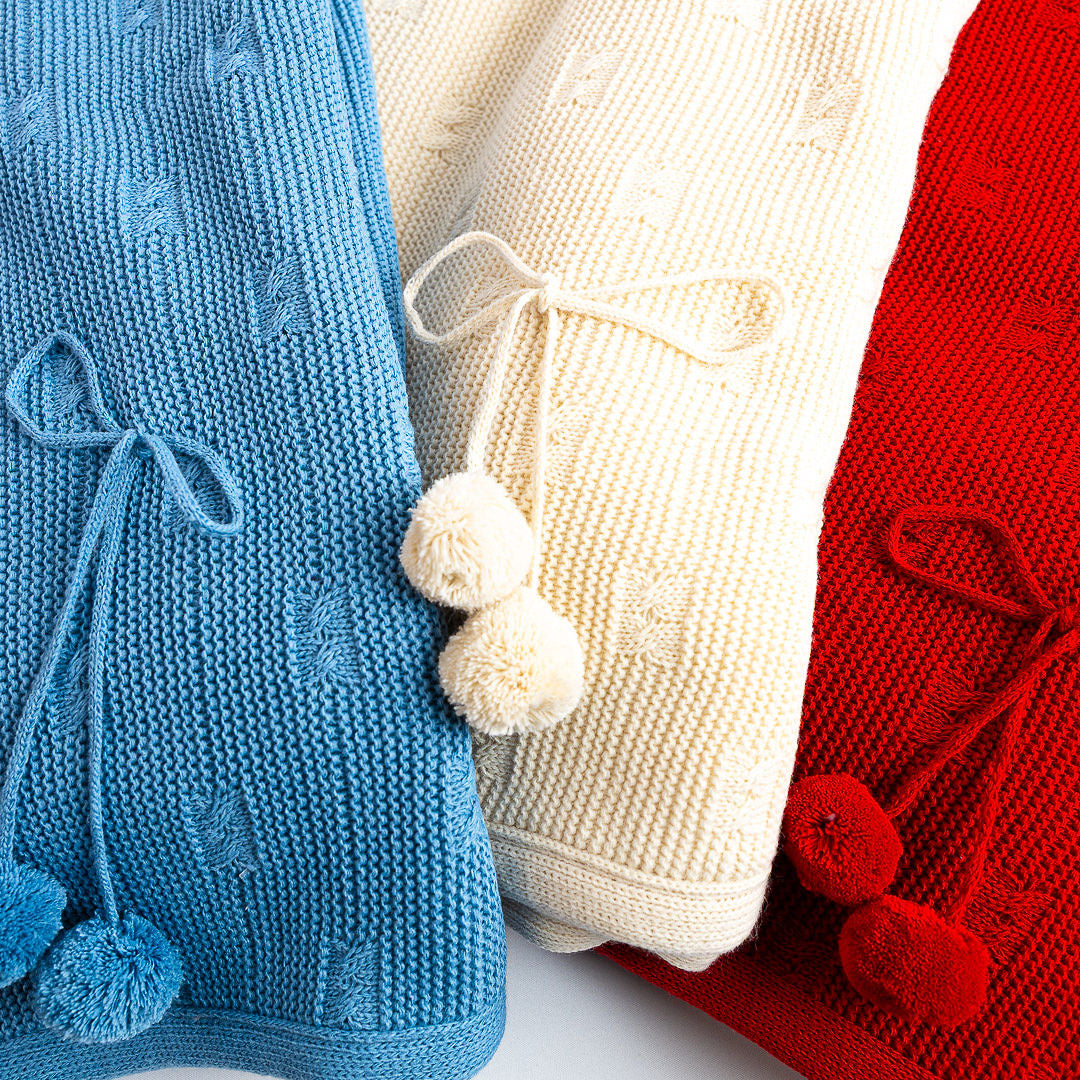 Manta Pompones Clásica